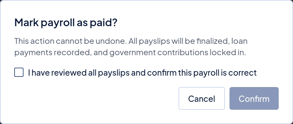 The Mark payroll as paid confirmation, with the required review checkbox above Confirm.